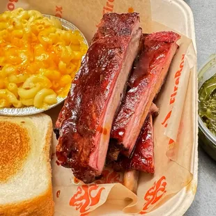 Pork Ribs Plate with Mac n Cheese, Collard Greens and Texas Toast.