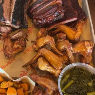 Sweet potatoes, greens, chicken wings, ribs, and brisket (Firebox Feast)