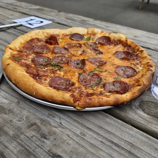 Pepperoni pizza- crust is crunchy and chewy, holds up well to the cheese, sauce and pepperonis.