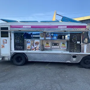 a food truck parked in a parking lot