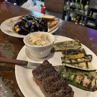 8oz steak grilled veggies and slaw.