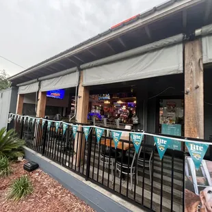 Outside seating, with bar area looking inside the restaurant