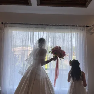 You can see the guest walk down to the ceremony from the bridal suite! Such a fun touch.