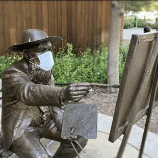 There is no evidence that Monet wore a mask while painting during the Spanish Flu pandemic. But he should have.