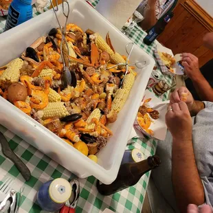 Cottage boil with added mussels, crab legs, and scallops