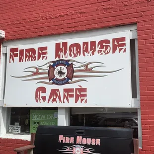 a truck parked in front of the restaurant