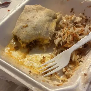 Oily and messy breakfast burrito and burnt and oily hash browns.