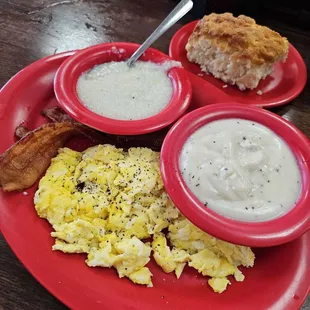 Three eggs (scrambled) with bacon, grits, and biscuit (and gravy).