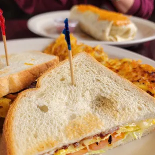 a plate with a sandwich and fries