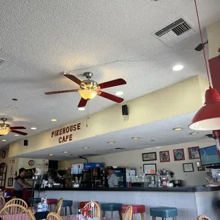 Counter as well as tables and booths.