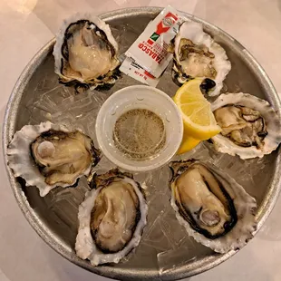Happy Hour Oysters $2 each with 6 oyster minimum. Steamboat oysters from WA were served on 12/8/23.
