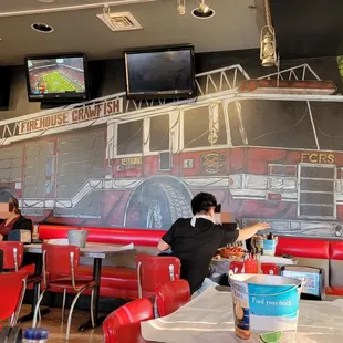 a fire truck painted on the wall