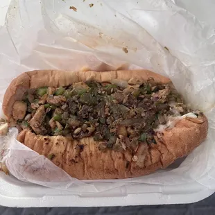 a sandwich in a styrofoam container