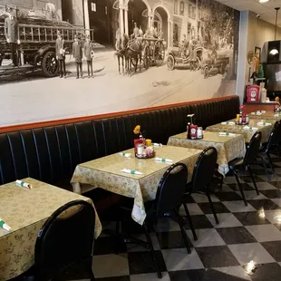 Inside the dining room with our Large black and white mural. It is a picture of Alexandria Fire Company. It is dated July 1920.
