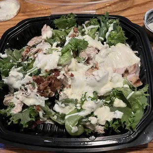 this chicken salad was not what i expected . big prices of lettuce The ranch was thick and tasted old. I was not satisfied with my food.