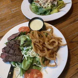 Steak salad with onion straws and ranch dressing. The other is the chicken salad. Nice and juicy. Both are so delicious.