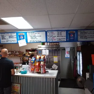 a man standing at a counter