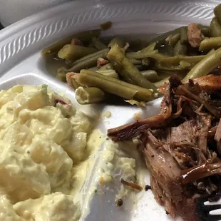 Brisket, potato salad and green beans with bacon. Yum
