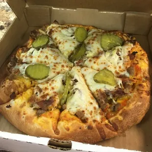 Try one of our specialty pizzas 
 This is our cheeseburger pizza 
 Try one it might make your day