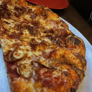 1/2 Pepperoni and 1/2 pepperoni, ham and bacon large pizza