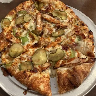 a sliced pizza on a plate