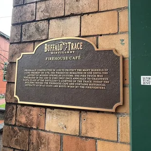 plaque on brick building