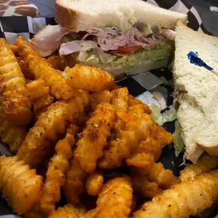 Turkey club with fries.