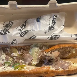 This was my Firehouse Steak and Cheese I ordered 5/15/23. It is exactly how I opened the box. Paper was sitting on top of the sandwich.