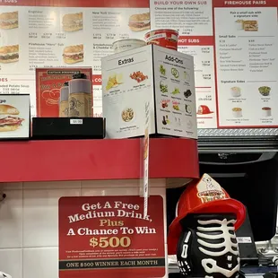 a skeleton in a fireman's helmet