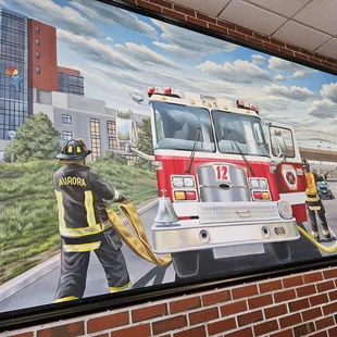 a mural of a fire truck