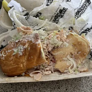 a sandwich in a styrofoam container