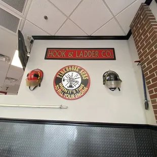 a fireman&apos;s helmet on the wall