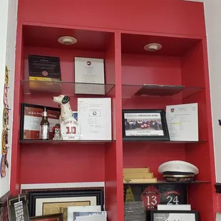 a fire station sign on a red bookcase