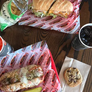 two sandwiches and a pickle