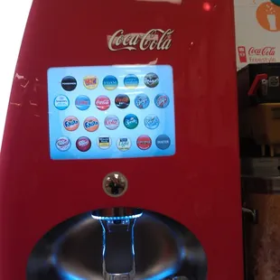 the crazy awesome coke fountain drink dispenser