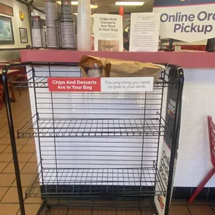 a shopping cart with a dog on it