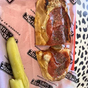 a hot dog and a pickle