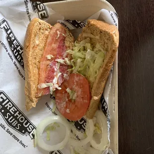 a sandwich in a styrofoam container