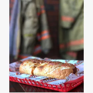 a hot dog in a basket