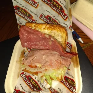 a sandwich in a styrofoam container