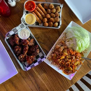 Lettuce wraps, appetizer sampler, and boneless wings