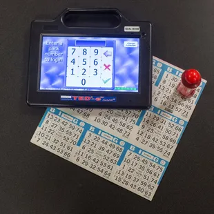 a table with a lottoon and a ticket