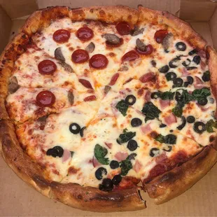 Deep Dish Pizza with Garlic Butter &amp; Parm Crust. Half Pepperoni and Sausage, Half Black Olives, Basil, and Ham.