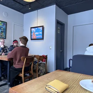 a group of people sitting at a table