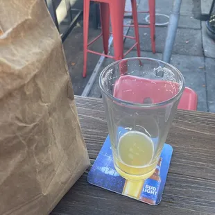 IPA on tap, sitting in small outdoor area