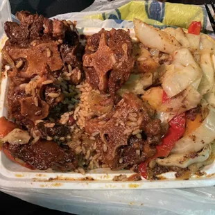 Rice and Peas and cabbage  Oxtail. All gross.