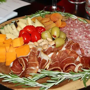 The Holiday Charcuterie Board was great for sharing. The traditionally seasoned dry cured meats were salty, the hard cheeses mild yet savory