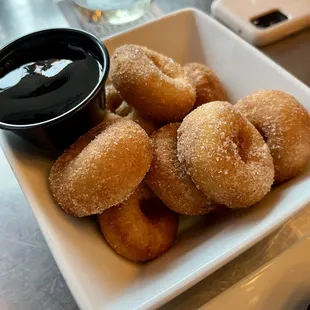 Mini donuts with raspberry sauce