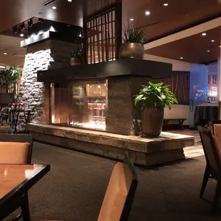 a restaurant with tables and chairs