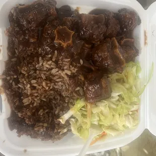 Ox tails, cabbage and dirty rice and beans